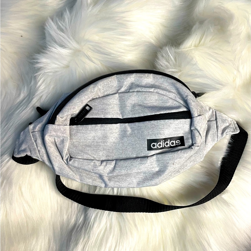 Adidas Fanny Pack light gray never used but has a small dot from being stored